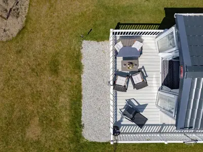 an overhead view of a white house with a porch at Rose View in Newquay