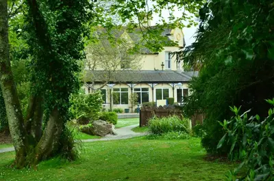 a house with a garden in front of it at Charming & Spacious Holiday Home in Hayle