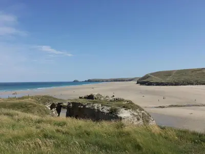 a view of a beach with people on the sand at Perran Pearl B in Perranporth