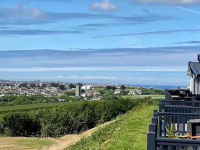 a view of the city from the top of a house at ELITE BLUE LUXURY 3 BEDROOM LODGE NEWQUAY, CORNWALL in Newquay