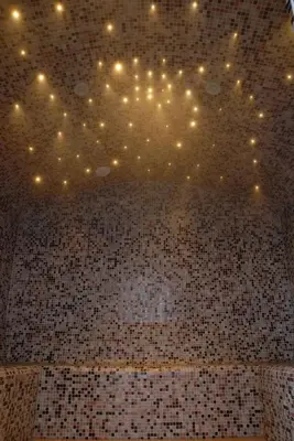 a ceiling with lights on a tiled wall at Skylark sleeps 8 private Hot Tub & Dogs welcome Nr Padstow, Resort Pool Bar & Watersports in Saint Columb Major