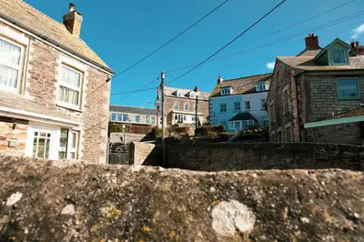 a view of houses from a wall in a city at Stowaway, Port Isaac Bay Holidays in Port Isaac