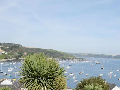 a bunch of boats are docked in a harbor at Hazel Cottage in Budock Water