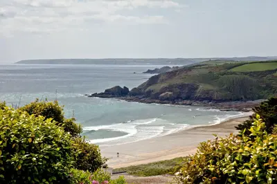 a view of a beach with the ocean at Spindrift - Hot Tub - Free WiFi - Free Parking - Pet Friendly in Praa Sands