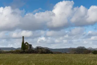 an old house in the middle of a field at Finest Retreats - Tinners Rest in St Austell