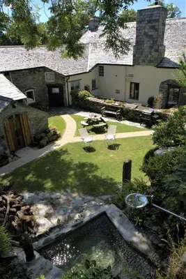 an aerial view of the backyard of a house at Ta Mill Holiday Cottages & Lodges - Forge Cottage in Launceston
