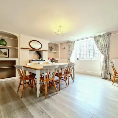 a dining room with a table and chairs at Ta Mill Holiday Cottages & Lodges -Ta Mill House in Launceston