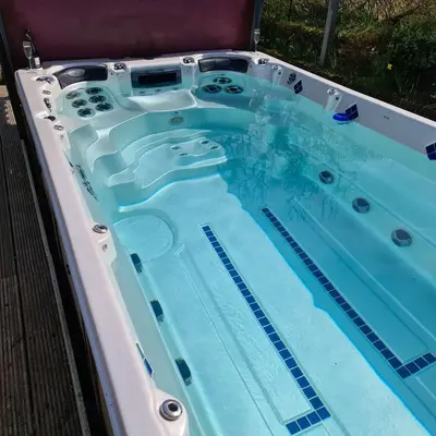 a hot tub with water in the middle at Ta Mill Cottages & Lodges - Hayloft Cottage in Launceston
