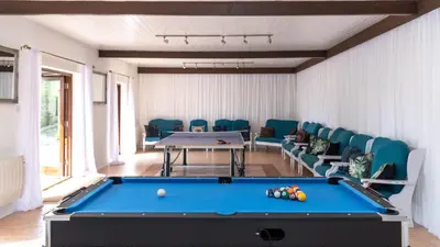 a billiard room with a pool table and chairs at Ta Mill Cottages & Lodges - Brookview Lodge 2 in Launceston