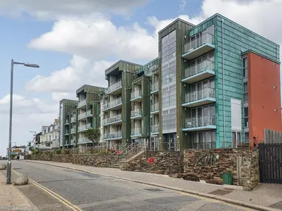 an apartment building on the side of a street at Apartment 4, Zinc in Newquay