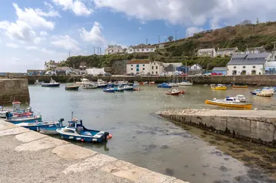 a group of boats are docked in a harbor at Finest Retreats - The Hideaway - Studio Apartment in Porthleven in Porthleven