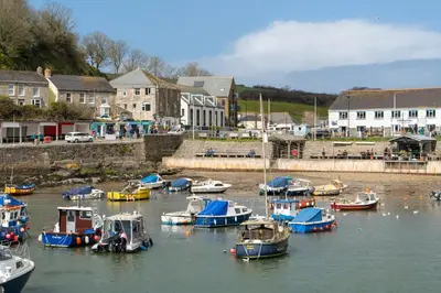 a group of boats are docked in a harbor at Finest Retreats - The Hideaway - Studio Apartment in Porthleven in Porthleven