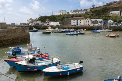 a group of boats are docked in a harbor at Finest Retreats - The Hideaway - Studio Apartment in Porthleven in Porthleven
