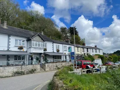 a row of houses on the side of a road at 4 Trenhaile Terrace in Truro