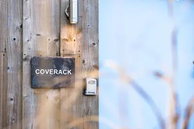 a door with a sign that says coverack on it at Coverack in Budock Water