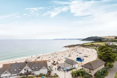 an aerial view of a beach with people on it at St Michaels The Liner in Falmouth