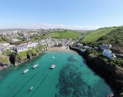 an aerial view of a harbor with boats in the water at Dane Cottage in Port Isaac