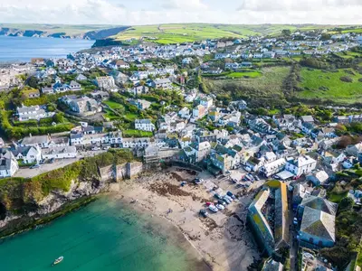 an aerial view of a small town on the coast at Temple Cottage in Port Isaac