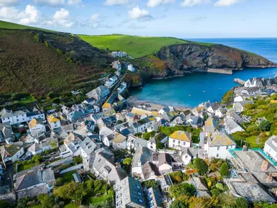 an aerial view of a small town on the coast at Temple Cottage in Port Isaac