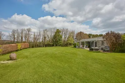 a large yard in front of a house at Meadow View in Newquay
