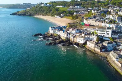 an aerial view of a town on the beach at Men an Mor in St Ives