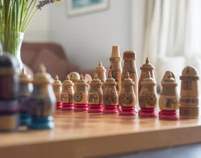 a group of wooden chessetts lined up on a table at 4 The Terrace in Padstow