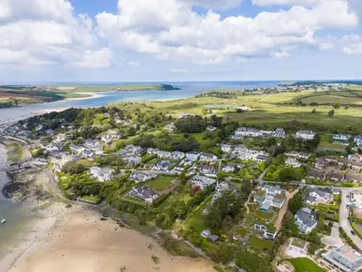 an aerial view of a beach with houses at Landers Field in Padstow