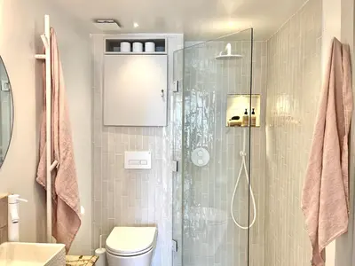 a bathroom with a shower and a toilet at The Tidal Shore - Adults Only - in Marazion