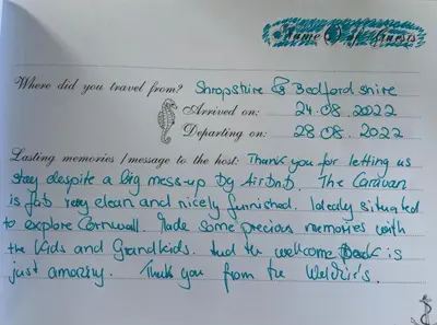 a handwritten letter with handwriting on a white paper at Newquay Bay Resort - Sea Breeze 61 in Newquay