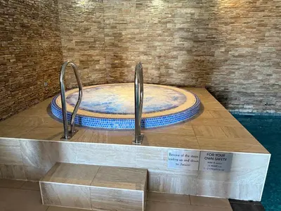 a statue of a bath tub on a display in a museum at Peninsula Apartment 2 in St Ives