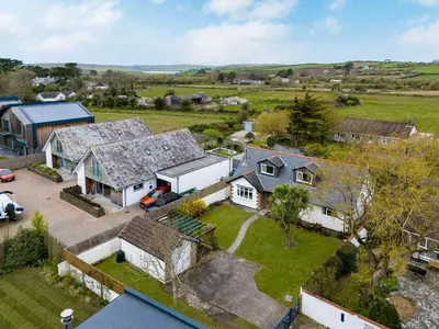 an aerial view of a house with a yard at Silverdale in Wadebridge