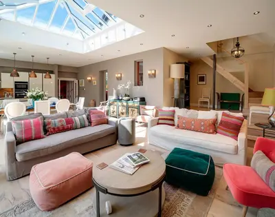 a living room with two couches and a living room with at Trevanion in Saint Minver