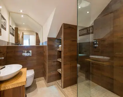 a bathroom with a sink and a toilet and a shower at Upper Deck in Padstow