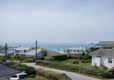 an aerial view of a residential street with houses at The Point in Polzeath