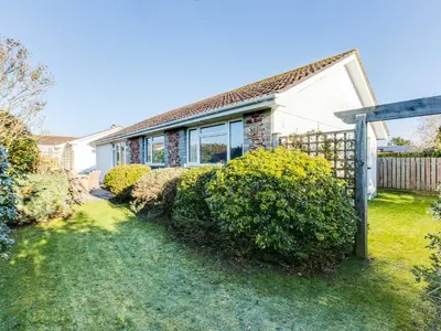 a house with bushes in front of it at Little Sailing in Padstow