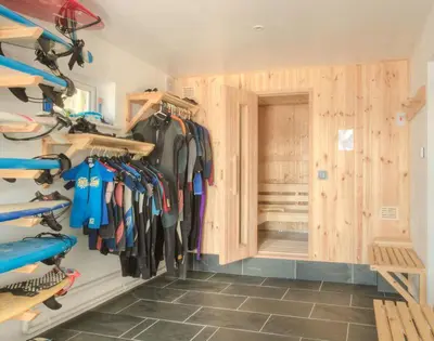 a room filled with lots of racks of shoes at Treverden in Polzeath