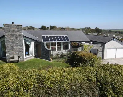 a house with solar panels on the roof at Penny Liggan in Padstow