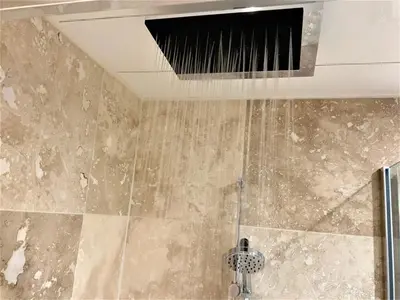 a bathroom with a shower with a ceiling at Westfields in Launceston