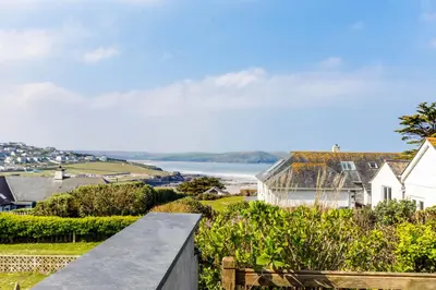 a view of the ocean from a house at Bella Vista in Polzeath