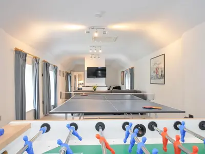 a ping pong room with a ping pong table at Orchard Cottage in Saint Endellion