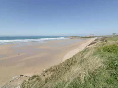a view of a beach with the ocean in the background at Fistral Drift in Newquay