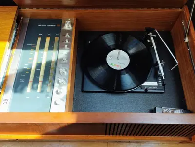 a wooden box with a cd and other records at Cosy barn on rural smallholding with alpacas, goats & pigs in Stithians