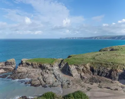 a view of the ocean and a rocky coastline at The View in Port Isaac