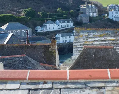 a view of a town with houses and roofs at Bre Cottage in Port Isaac