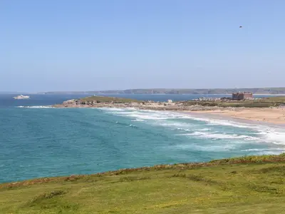 a view of a beach and the ocean at Penthouse 23 in Newquay