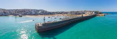 an aerial view of a pier in the water at Cheerful Fisherman,s Cottage in St Ives