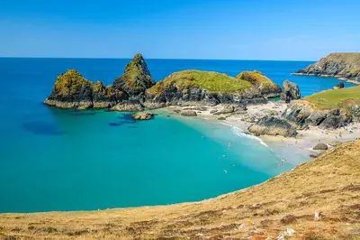 a view of a beach with rocks in the ocean at Hillside in St Austell