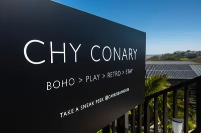a sign for a city company on a building at Chy conary in Carbis Bay