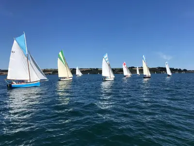 a group of sailboats on a large body of water at Puffin. Comfortable Annexe Central Falmouth in Falmouth