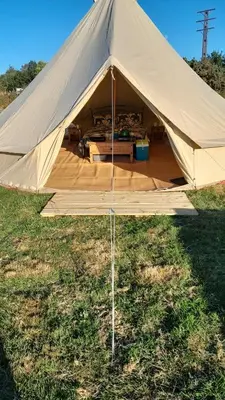 a large canvas tent in a field of grass at Cornish Skies Glamping in Pool